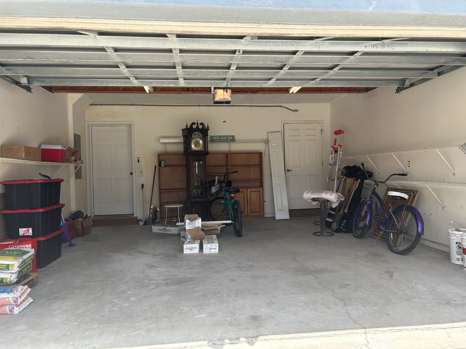 Garage interior after organizing and removing junk